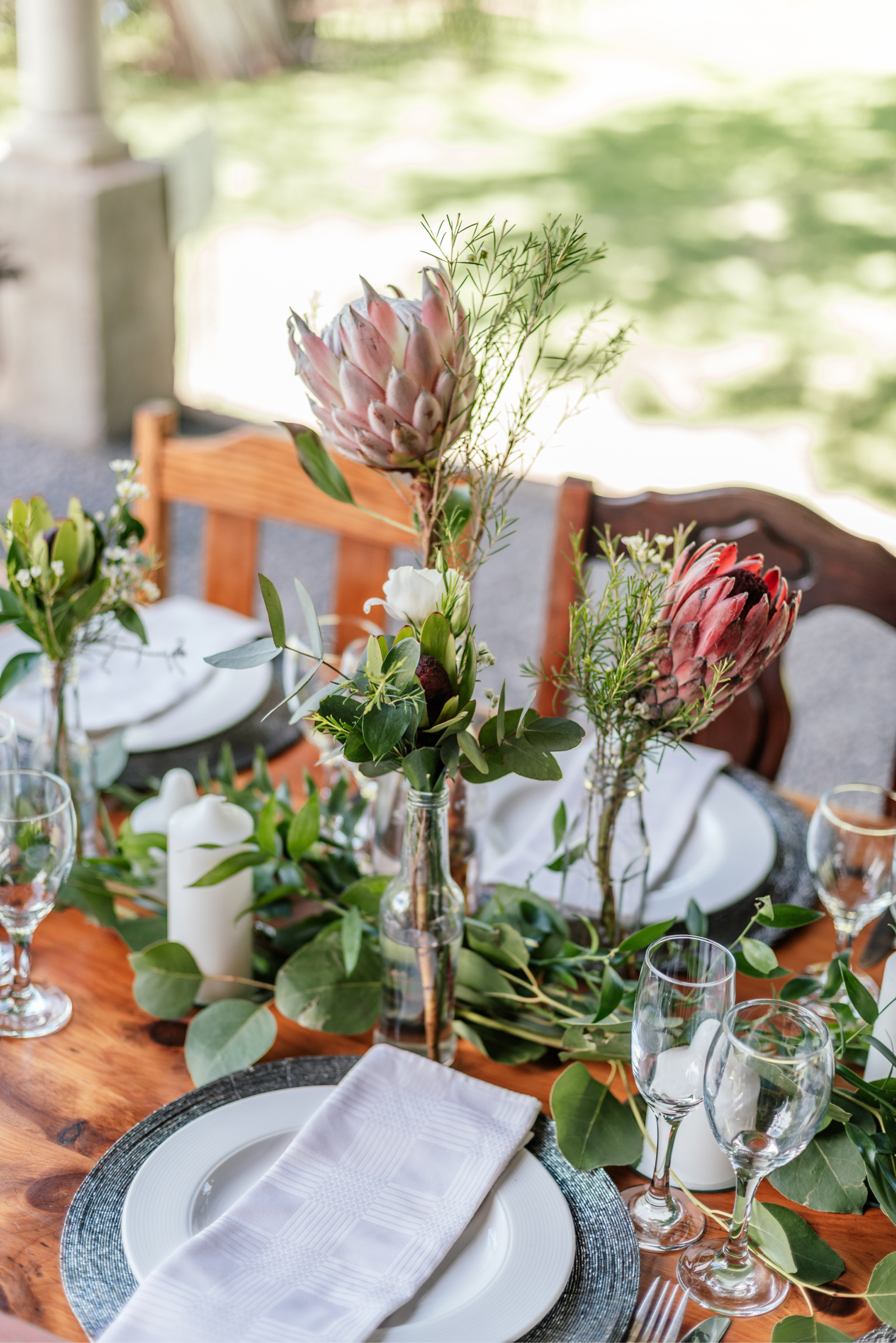 dinner table arrangement with protea
